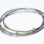 Interlocking Sterling and Gold Bangle