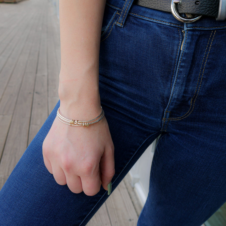 Interlocking Sterling and Gold Bangle